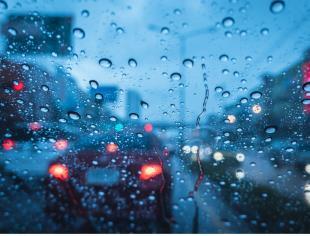 heavy-raining-strom-when-drive-at-evening-blue-chill-wet-windshield-picture-id1054750504