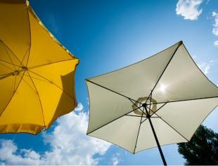 white-and-yellow-sun-umbrellas-picture-id160324646