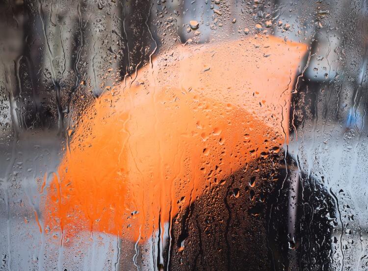 rainy-weather-and-raindrops-on-the-glass-picture-id1314058216
